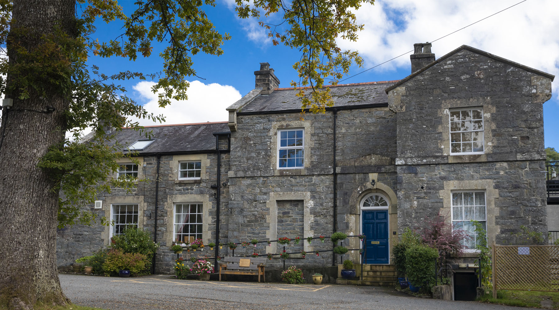 The front of Cartref Bryn yr Eglwys on a sunny day