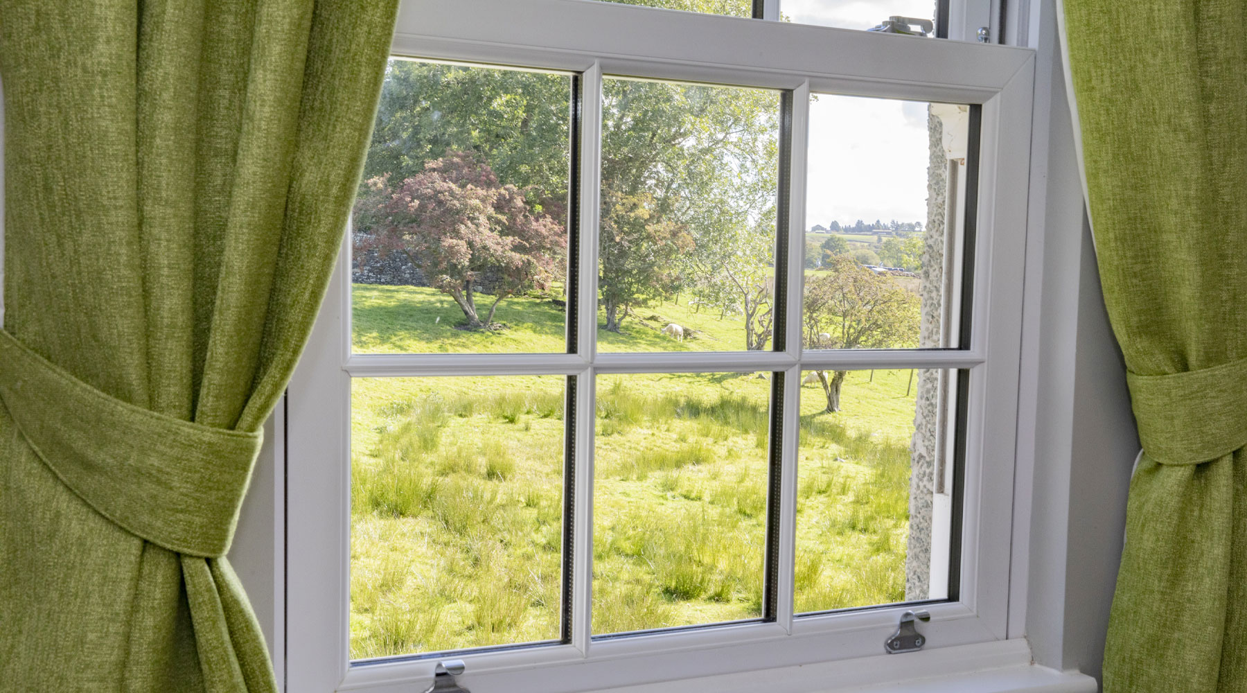 peaceful view of countryside out of window at Cartref Bryn yr Eglwys